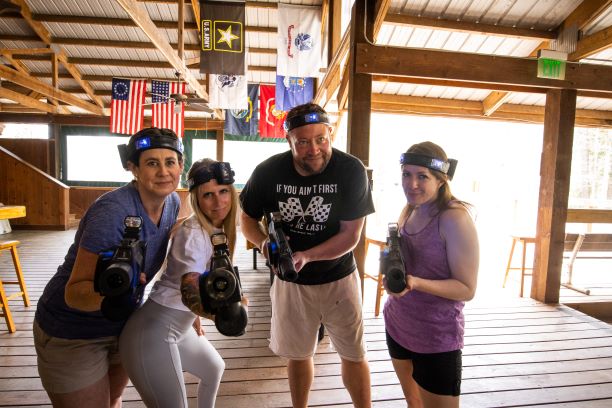 Blue Team-small Group holding laser tag guns