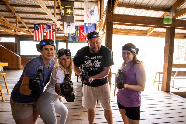 Group holding laser tag guns