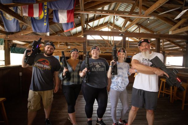 Group holding laser tag guns