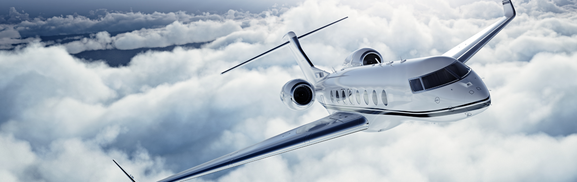 An airplane soaring above fluffy white clouds